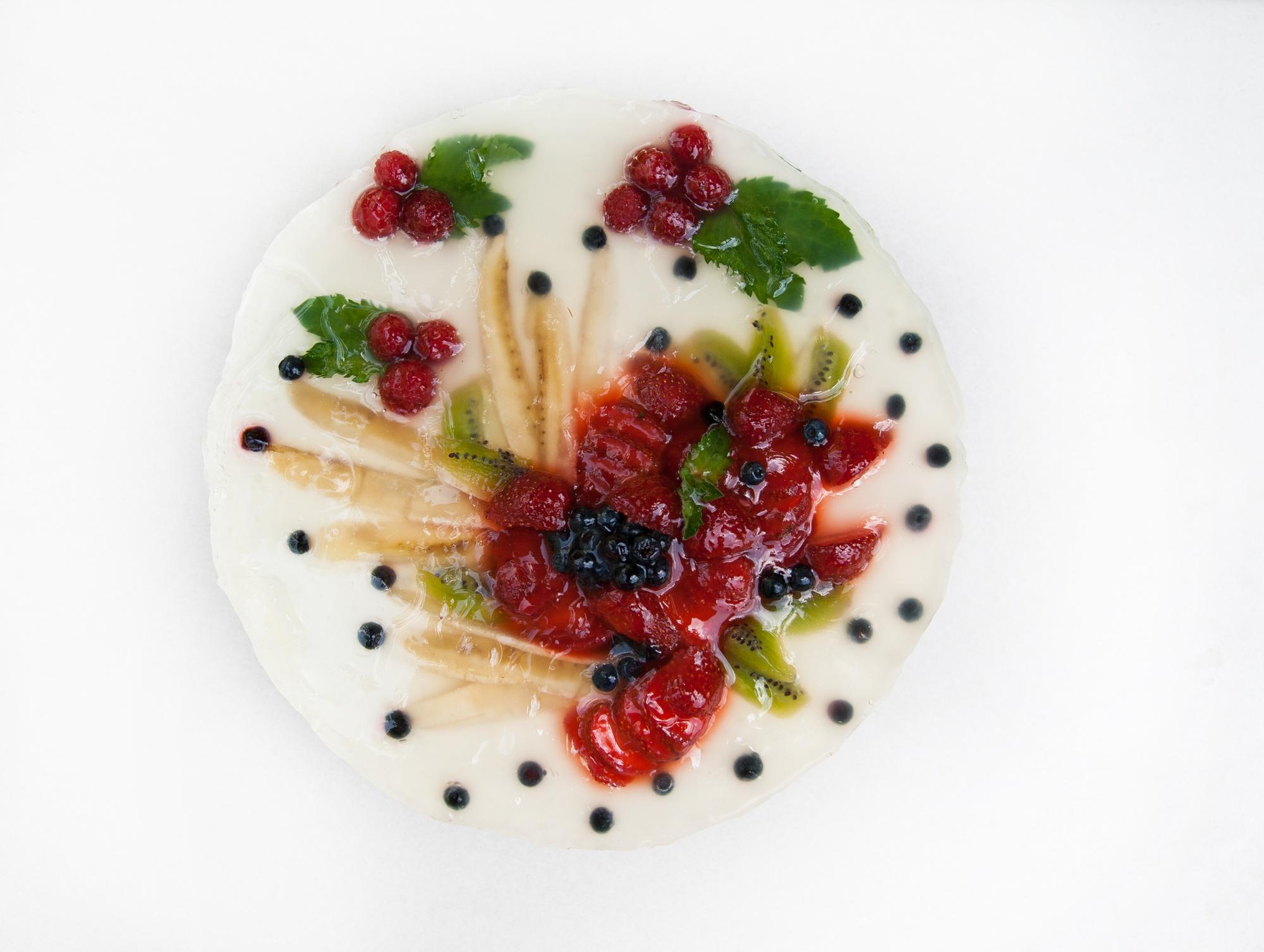 Plated dessert with berry sauce