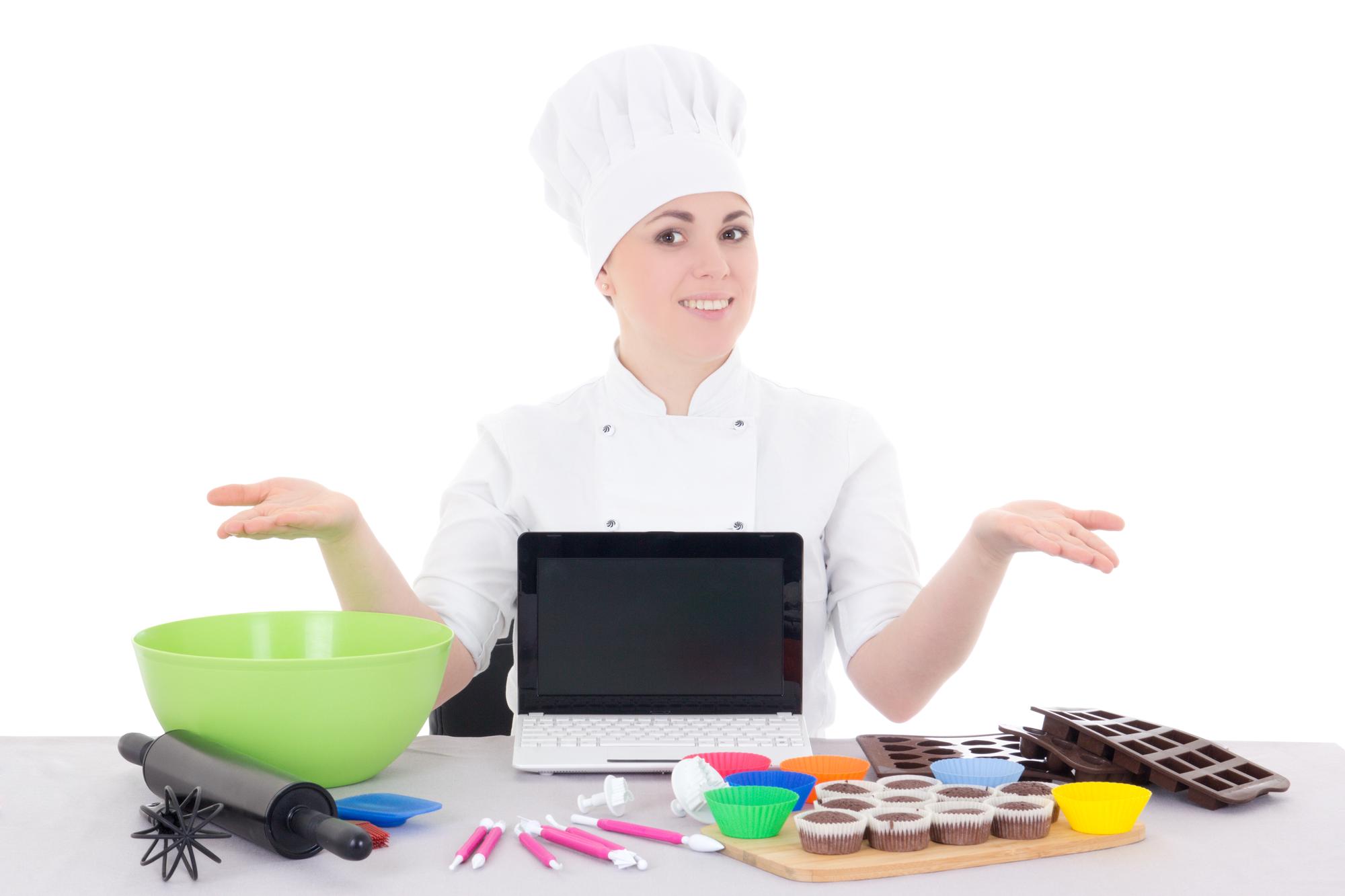 Instructor demonstrating a colorful recipe on a table